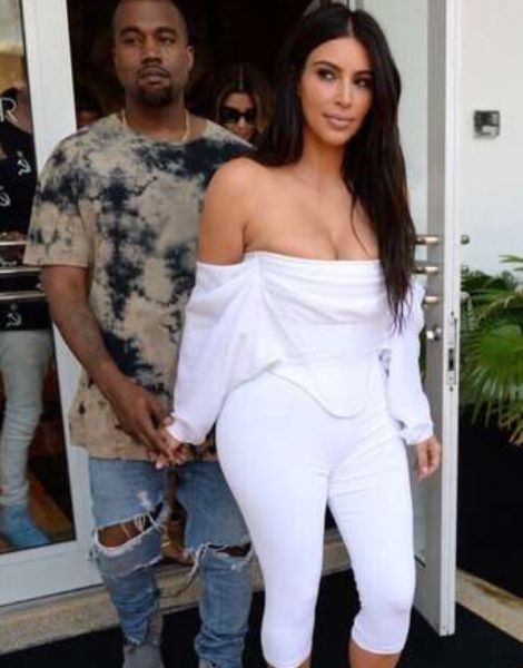 kim kardashian off shoulder top with white leggings